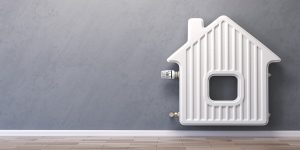 chauffage-radiateur-lbap chauffage électrique en forme de maison accroché sur un mur